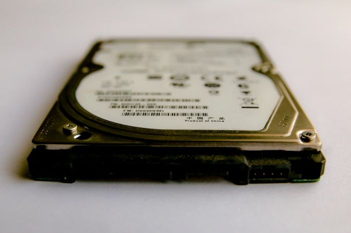 A hard drive that has failed, representing the risk of losing all your data without backups